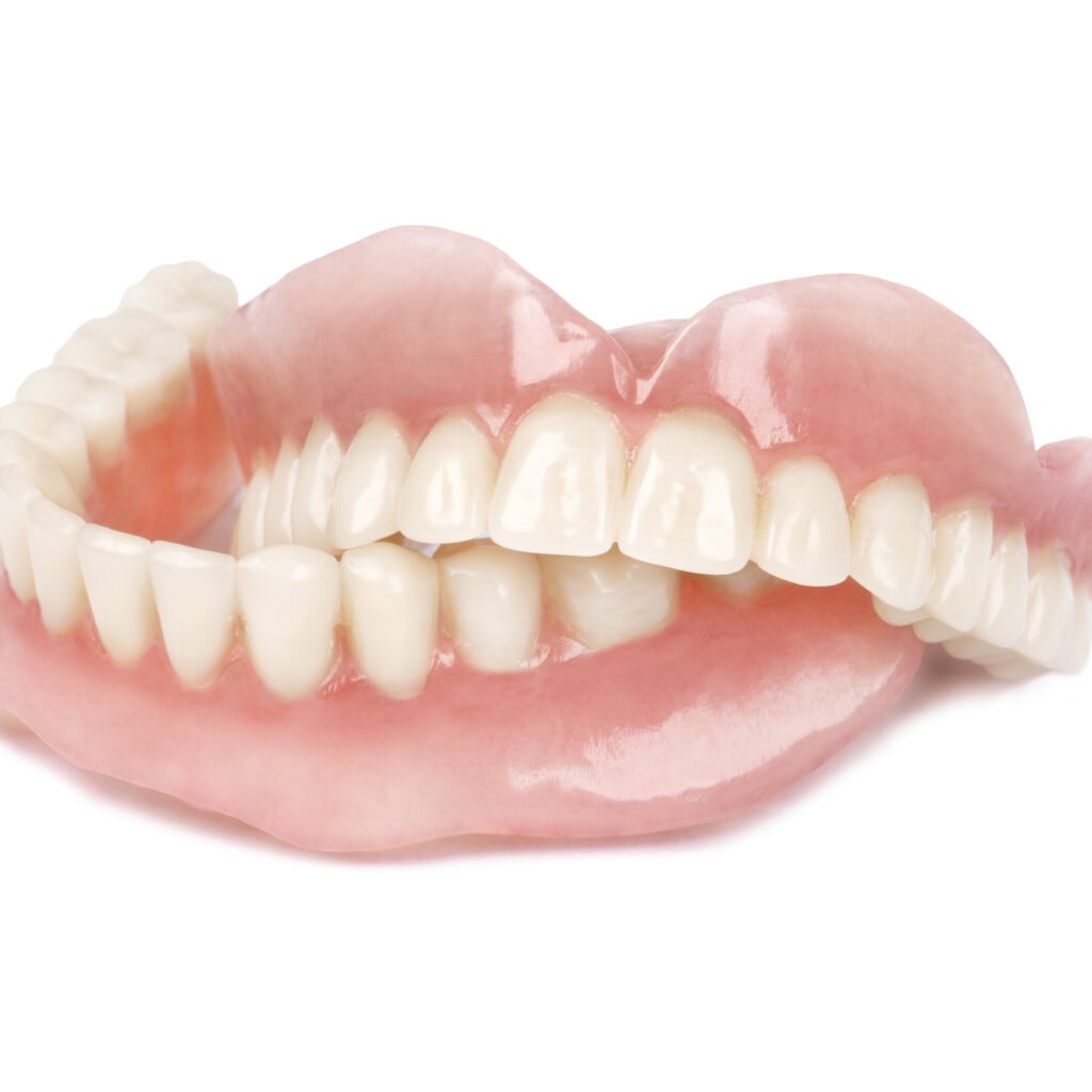 Image of a pair or set of full dentures, upper and lower