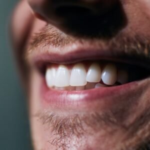 Closeup image of a man's smile